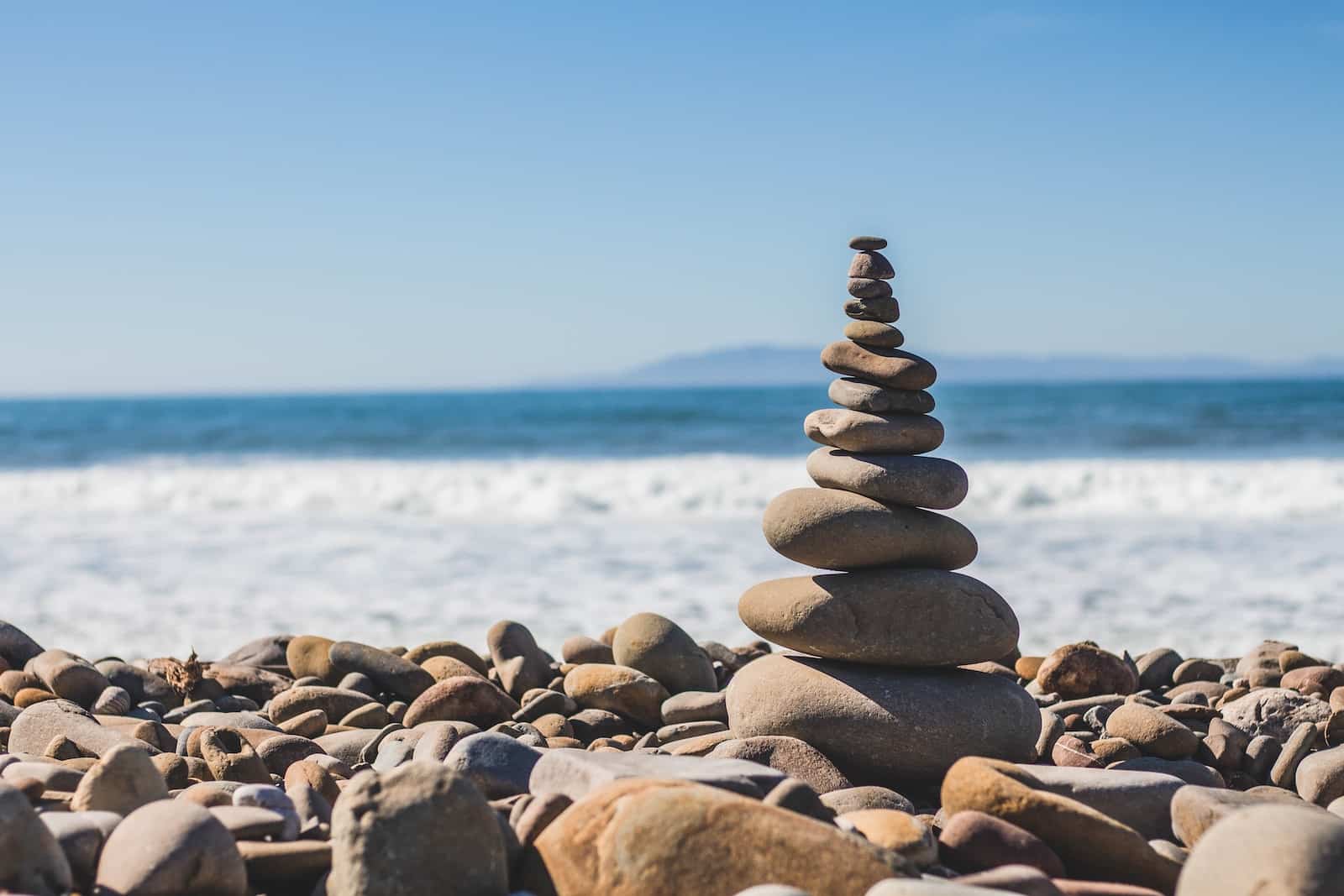 Health and Wellness; stack rock on seashore