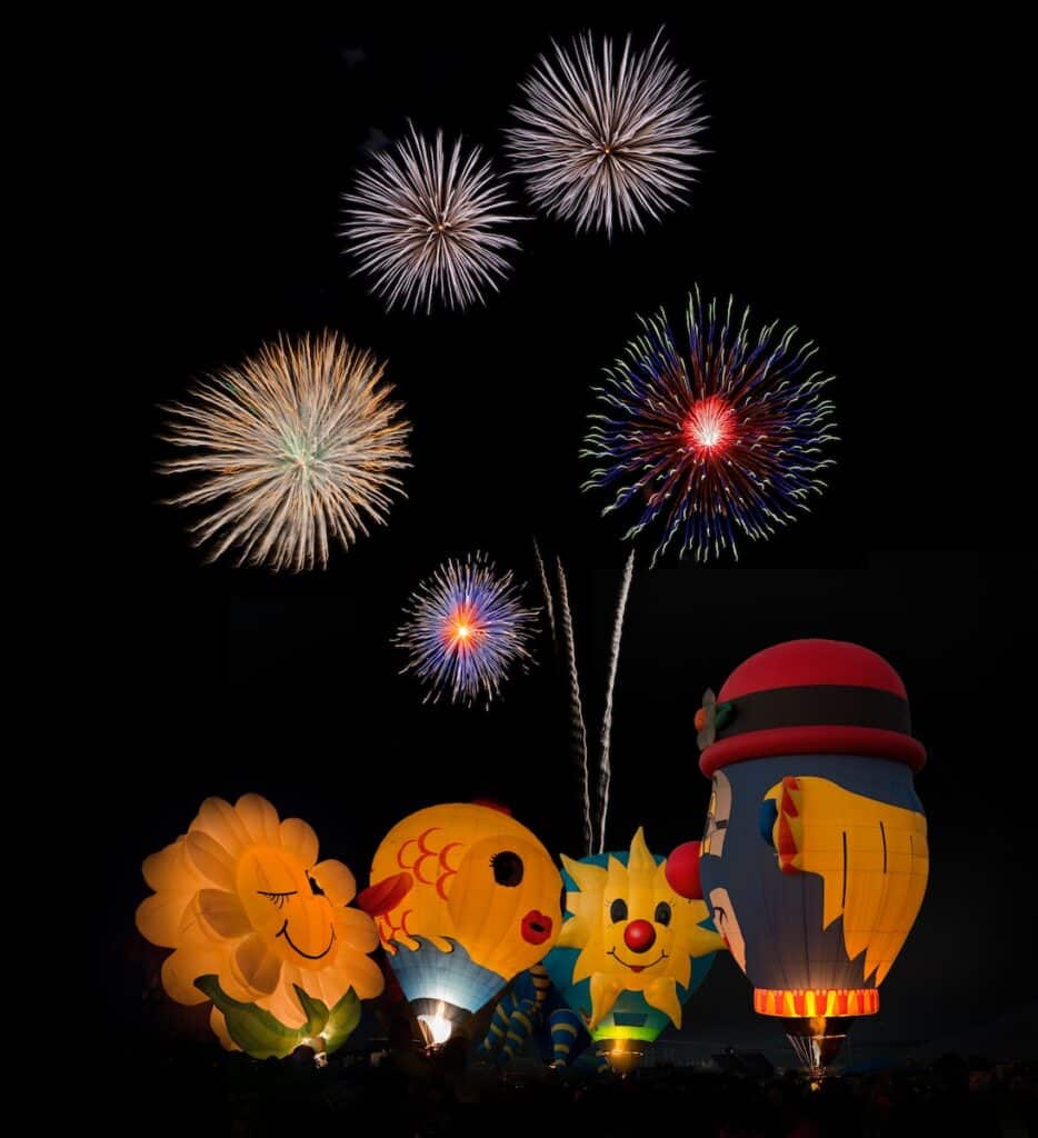 hot air balloons and fireworks display